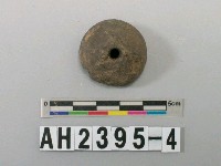 藏品(單錐形黑灰色細砂陶紡輪)的圖片